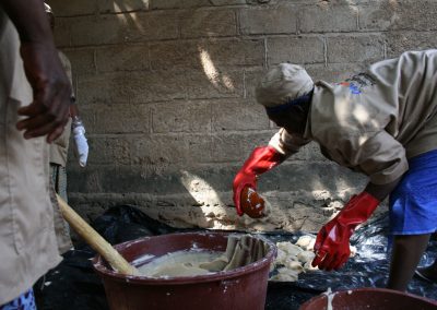 Woman in Cooperative making soap